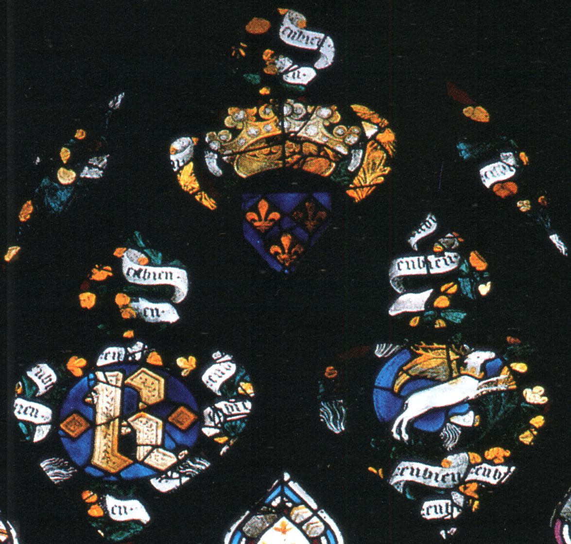 Partie haute du vitrail de la chapelle du Rosaire (baie 17) de la cath&eacute;drale d'Evreux. Le monogramme royal est associ&eacute; aux armes,&nbsp;aux devises du cerf volant et du gen&ecirc;t et au mot EN BIEN (entre 1387&nbsp;et 1390).&nbsp;