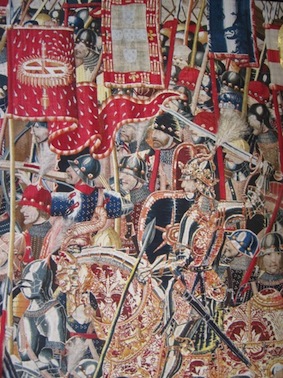Le roi Alphonse V et son &eacute;tendard &agrave; la devise de la roue de moulin lors de l&rsquo;exp&eacute;dition &nbsp;contre Arzila en 1471. Tapisserie de Pastrana.